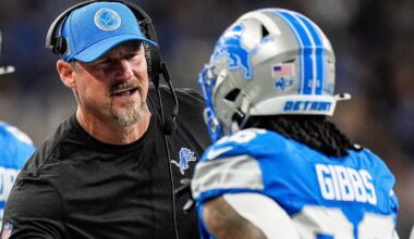 Detroit Lions head coach Dan Campbell shakes hands with running back Jahmyr Gibbs (26) after Sam LaPorta's touchdown against Tennessee Titans during the first half at Ford Field in Detroit on Sunday, Oct. 27, 2024.