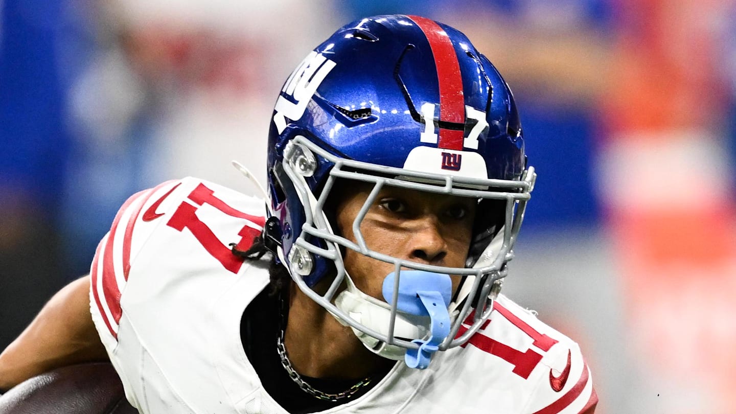 Nov 23, 2025; Detroit, Michigan, USA; New York Giants wide receiver Wan'Dale Robinson (17) runs upfield after catching a swing pass in the second quarter against the Detroit Lions at Ford Field. Mandatory Credit: Lon Horwedel-Imagn Images