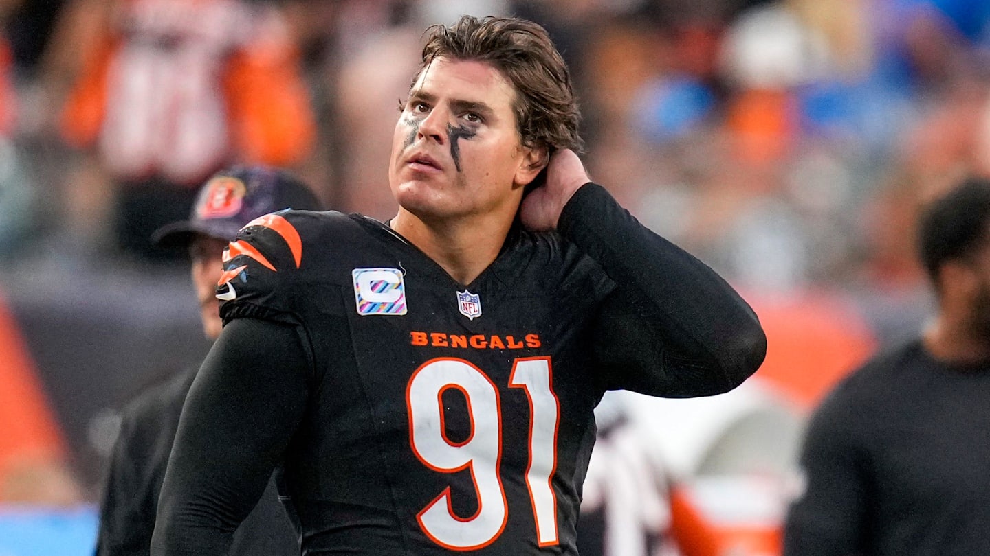 Cincinnati Bengals defensive end Trey Hendrickson (91) watches a replay as the Detroit Lions celebrate a touchdown in the fourth quarter of the NFL Week 5 game between the Cincinnati Bengals and the Detroit Lions at Paycor Stadium in downtown Cincinnati on Sunday, Oct. 5, 2025. The Bengals continued a losing streak, falling 37-24 to the Lions.