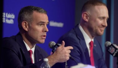 Brandon Beane, president of football operations and general manager for the Buffalo BIlls, and head coach Joe Brady take turns answering questions during a press conference that introduced Brady as the new head coach at the Bills field house in Orchard Park on Jan. 29, 2026.