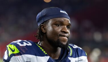 Former Seattle Seahawks linebacker Boye Mafe on the sidelines