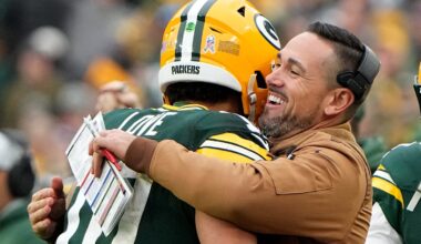 Green Bay Packers quarterback Jordan Love (10) is hugged by head coach Matt LaFleur after throwing a touchdown pass during the fourth quarter of their game at Lambeau Field Sunday, November 5, 2023, in Green Bay, Wisconsin.