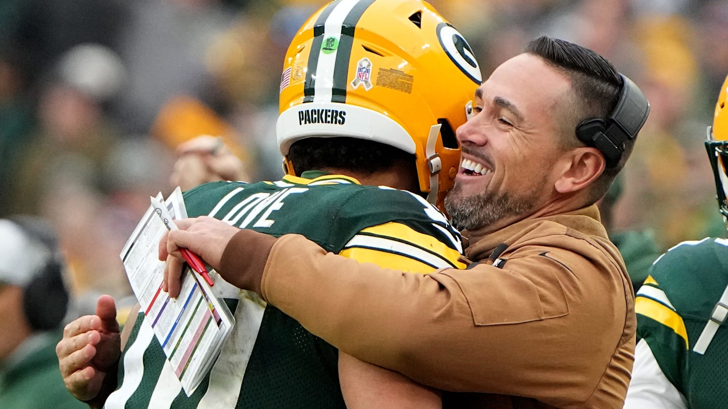 Green Bay Packers quarterback Jordan Love (10) is hugged by head coach Matt LaFleur after throwing a touchdown pass during the fourth quarter of their game at Lambeau Field Sunday, November 5, 2023, in Green Bay, Wisconsin.