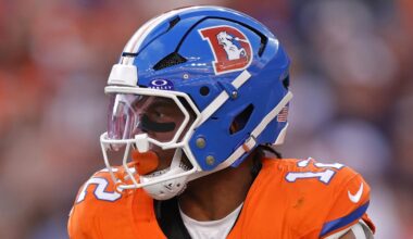 Jan 4, 2026; Denver, Colorado, USA; Denver Broncos running back RJ Harvey (12) runs with the ball during the game against the Los Angeles Chargers during the first half at Empower Field at Mile High. Mandatory Credit: Isaiah J. Downing-Imagn Images