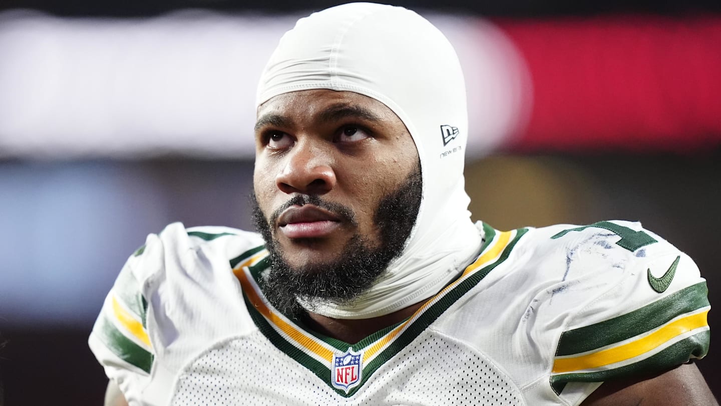 Dec 14, 2025; Denver, Colorado, USA; Green Bay Packers defensive end Micah Parsons (1) walks off the field with help from medical personnel following an injury during the third quarter against the Denver Broncos at Empower Field at Mile High.