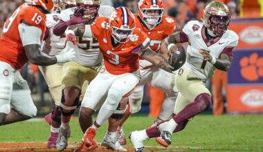 Nov 8, 2025; Clemson, South Carolina, USA; Florida State Seminoles quarterback Tommy Castellanos (1) runs near Clemson Tigers defensive end T.J. Parker (3) during the second quarter  at Memorial Stadium. Mandatory Credit: Ken Ruinard - GREENVILLE NEWS-USA TODAY Network via Imagn Images