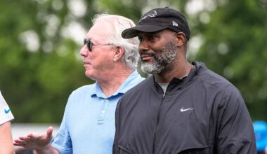Detroit Lions head coach Dan Campbell, left, talks to team president and CEO Rod Wood and general manager Brad Holmes after practice during training camp at Meijer Performance Center in Allen Park on Sunday, July 20, 2025.