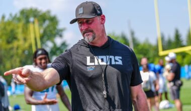 Detroit Lions head coach Dan Campbell talks to staff at the end of the joint practice with the Miami Dolphins at the Lions headquarters and training facility in Allen Park, Thursday, Aug. 14 2025.
