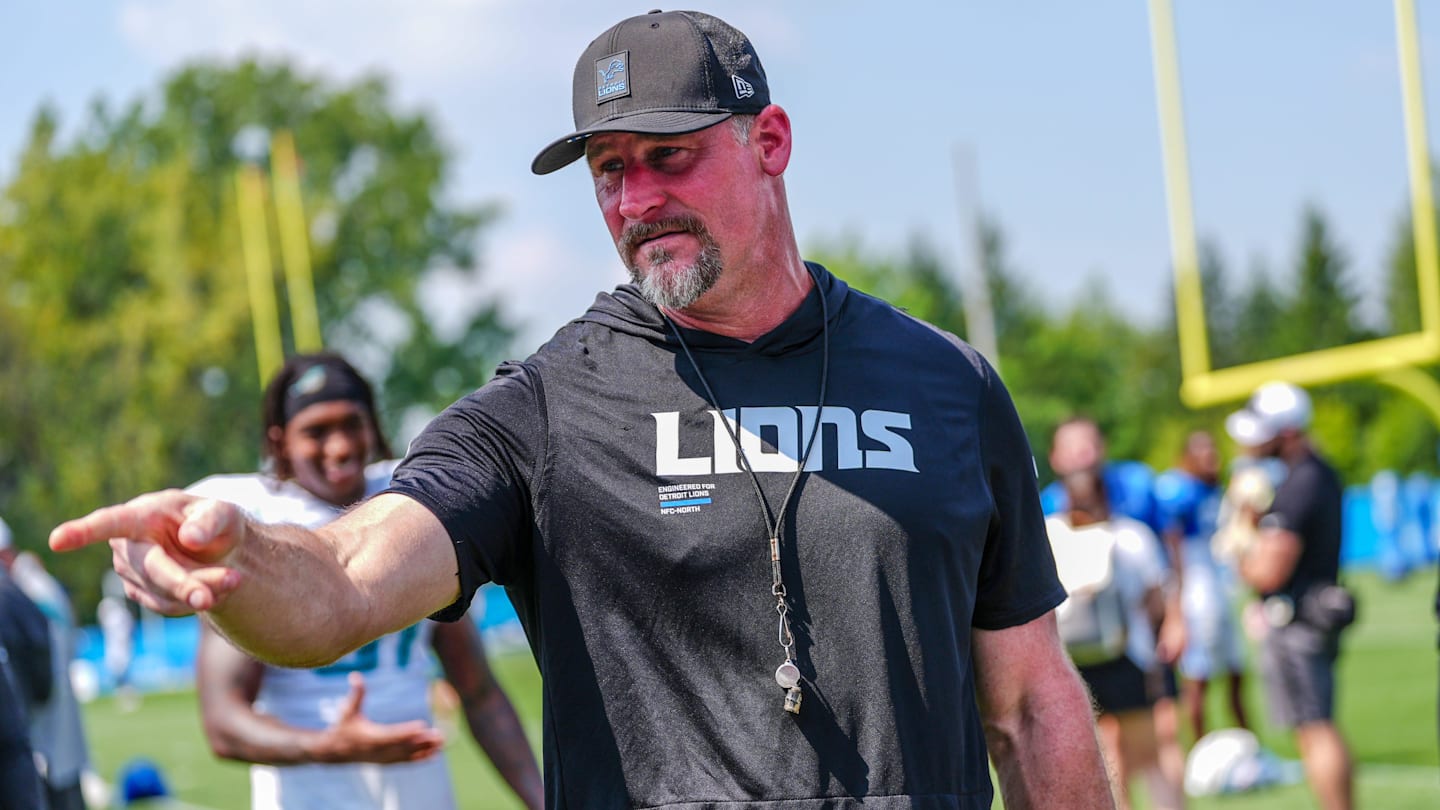 Detroit Lions head coach Dan Campbell talks to staff at the end of the joint practice with the Miami Dolphins at the Lions headquarters and training facility in Allen Park, Thursday, Aug. 14 2025.