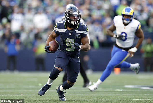 Walker (pictured) split carries with Charbonnet during the regular season in 2025