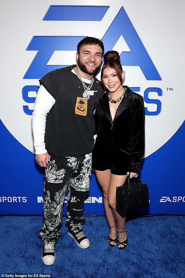 The 24-year-old is pictured with his girlfriend Chloe Rodriguez at the Madden Bowl