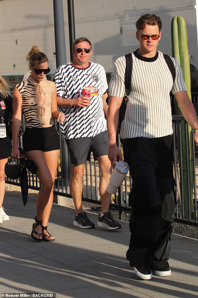 Burrow is seen walking a few feet in front of Ponton after being seen together a day earlier