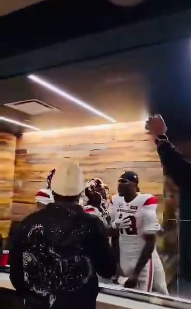 Former Kansas City Chiefs player Justyn Ross lashed out at a fan in outrageous scenes