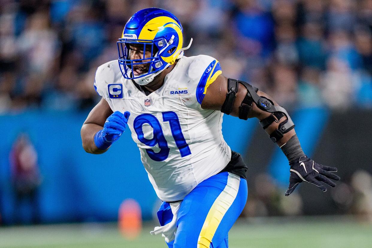 Rams defensive end Kobie Turner runs during a game.