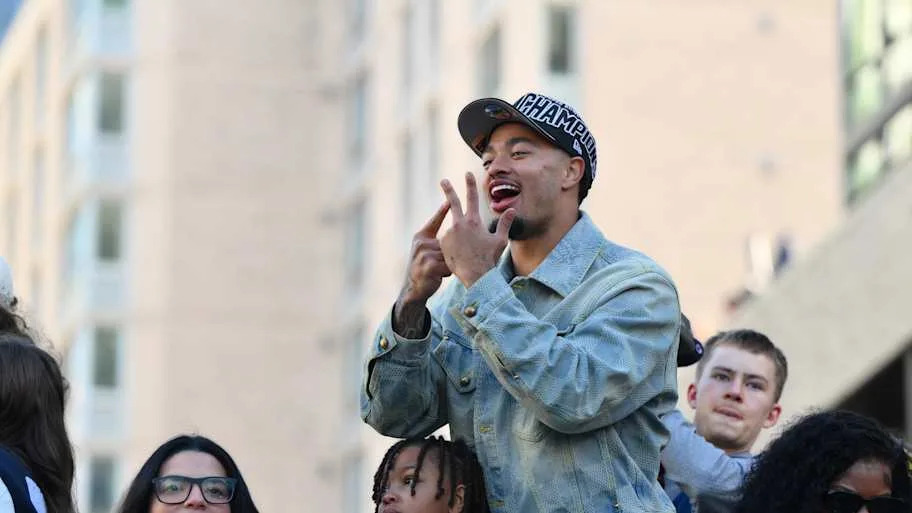 Seattle Seahawks wide receiver Jaxon Smith-Njigba interacts with fans during the Super Bowl LX World Champions parade