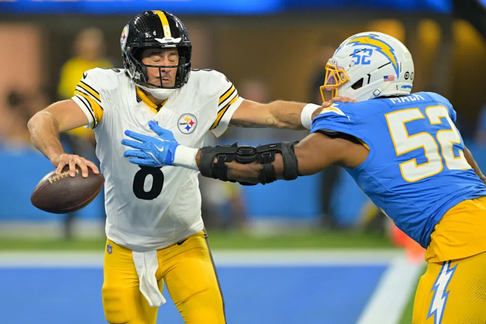 Nov 9, 2025; Inglewood, California, USA; Los Angeles Chargers linebacker Khalil Mack (52) sacks Pittsburgh Steelers quarterback Aaron Rodgers (8) for a safety during the first quarter of the game at SoFi Stadium. Mandatory Credit: Jayne Kamin-Oncea-Imagn Images