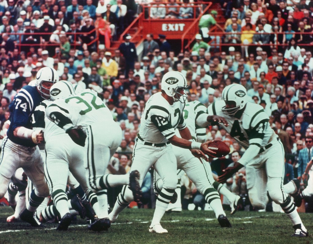New York Jets quarterback Joe Namath hands off the football to Matt Snell during Super Bowl III.