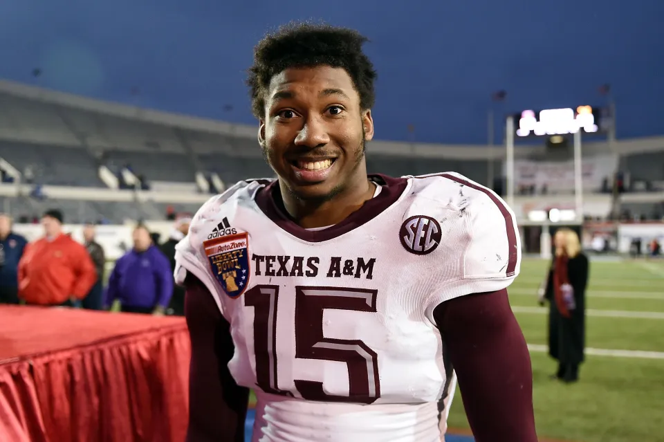 Myles Garrett #15 of the Texas A&M Aggies leaves the field following a victory over the West Virginia Mountaineers in the 56th annual Autozone Liberty Bowl at Liberty Bowl Memorial Stadium on December 29, 2014