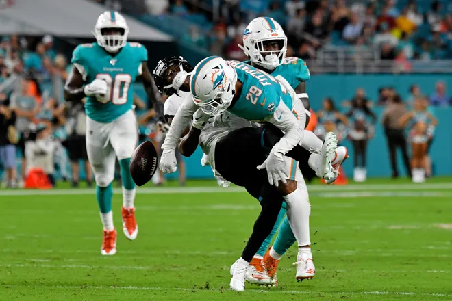 Miami Dolphins free safety Minkah Fitzpatrick breaks up the pass intended for Jacksonville Jaguars wide receiver Dede Westbrook.