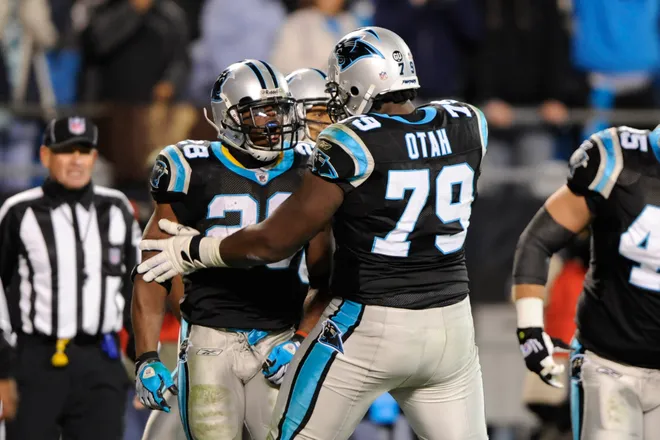 Carolina Panthers running back Jonathan Stewart celebrates his second quarter touchdown with tackle Jeff Otah.