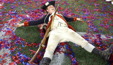 Patriots Minuteman mascot in confetti