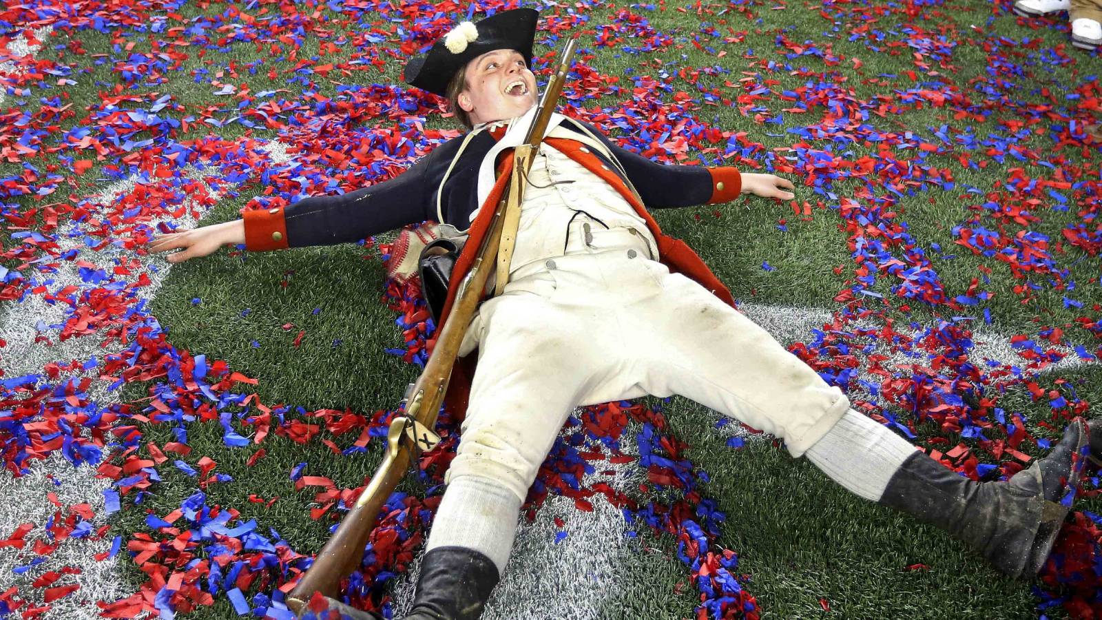 Patriots Minuteman mascot in confetti