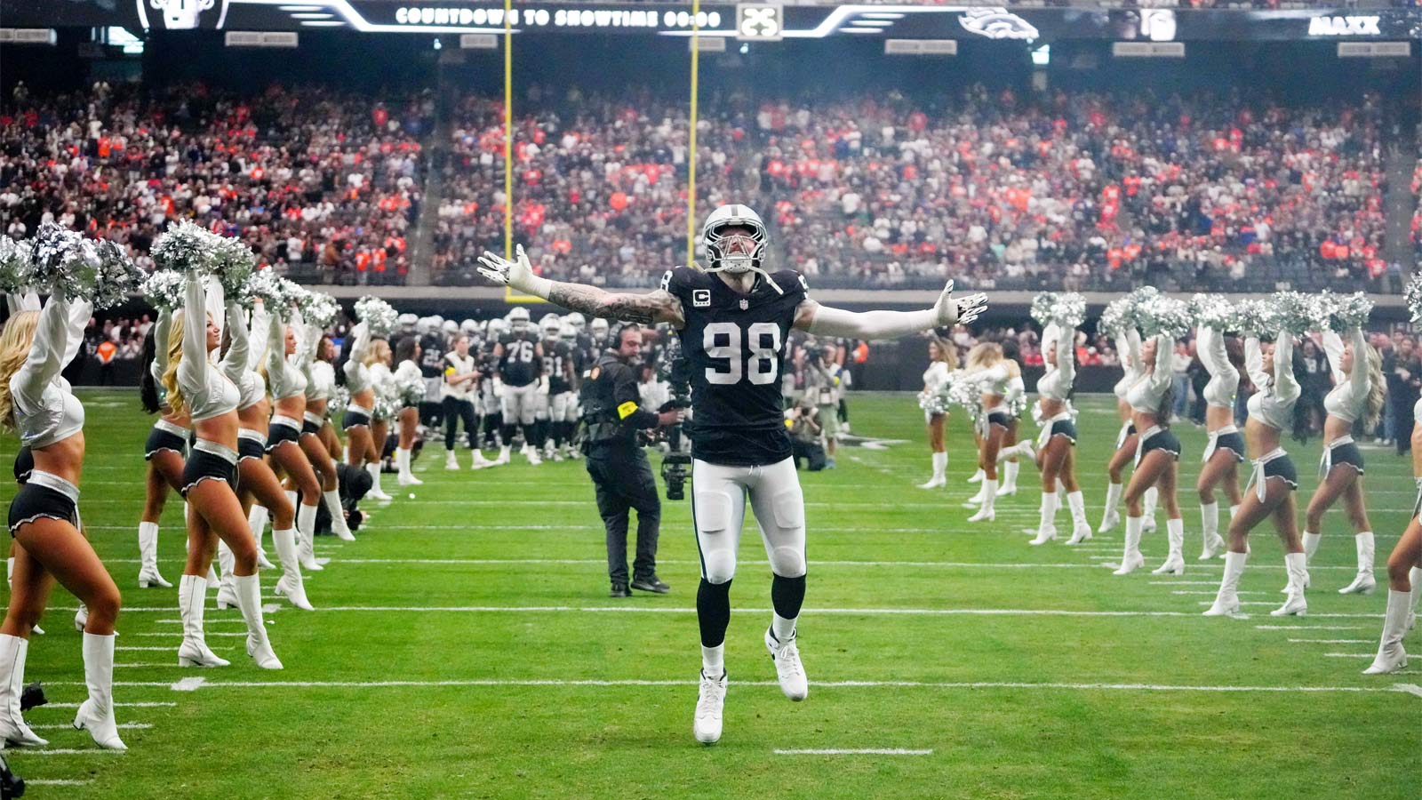 Las Vegas Raiders defensive end Maxx Crosby (98) takes the field prior to a game against the Denver Broncos at Allegiant Stadium.