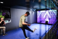 Dallas Cowboys star placekicker Brandon Aubrey takes part in a interactive soccer challenge...