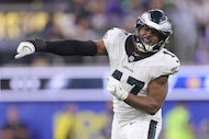 Philadelphia Eagles linebacker Nakobe Dean reacts after sacking Los Angeles Rams quarterback...