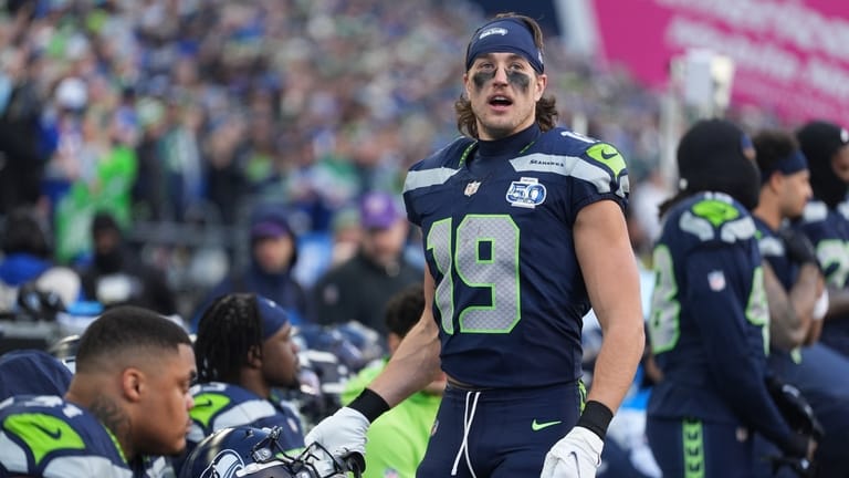 Seattle Seahawks wide receiver Jake Bobo (19) looks on from...