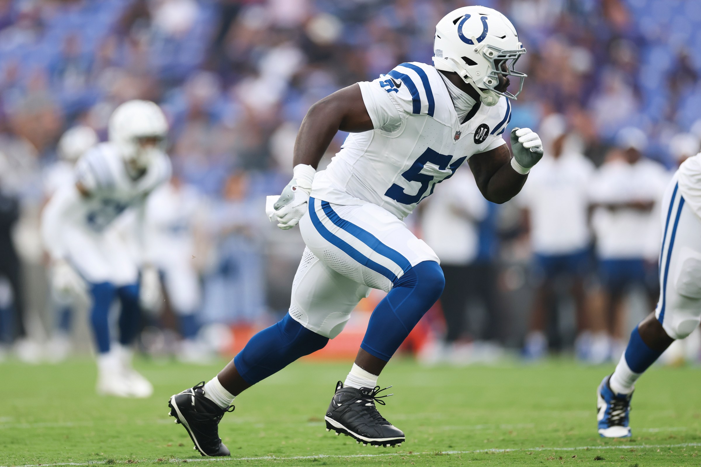 BALTIMORE, MD - AUGUST 7: Kwity Paye #51 of the Indianapolis Colts runs around the edge during an NFL Preseason 2025 game against the Baltimore Ravens at M&T Bank Stadium on August 7, 2025 in Baltimore, Maryland. (Photo by Logan Bowles/Getty Images)