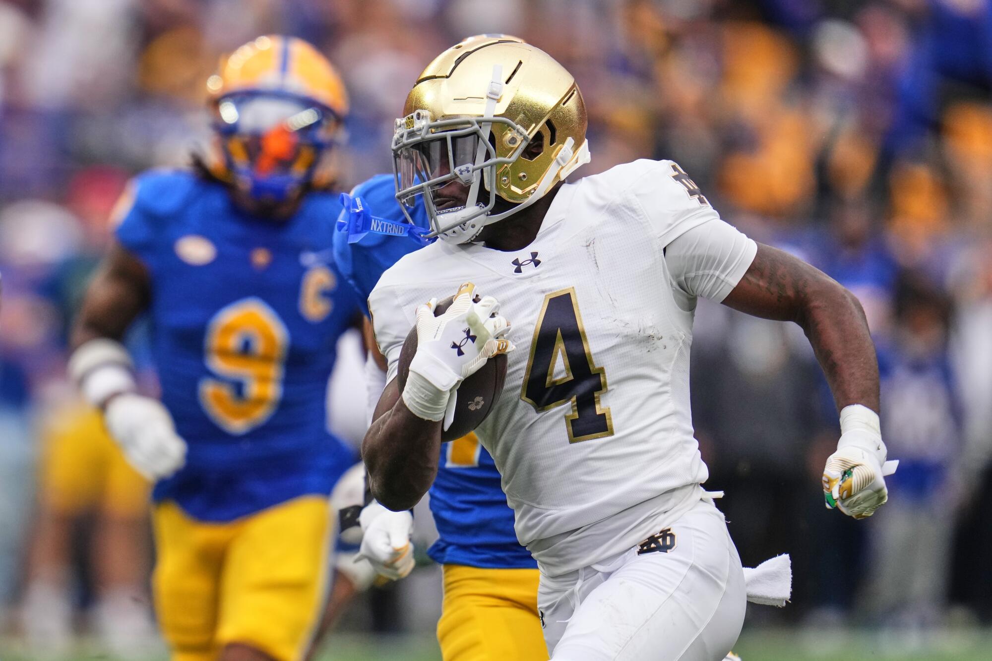 Notre Dame running back Jeremiyah Love carries the ball against Pittsburgh in November.
