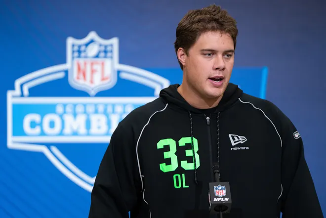 Feb 28, 2026; Indianapolis, IN, USA; Utah offensive lineman Caleb Lomu (OL33) speaks to members of the media during the NFL Combine at the Indiana Convention Center. Mandatory Credit: Jacob Musselman-Imagn Images