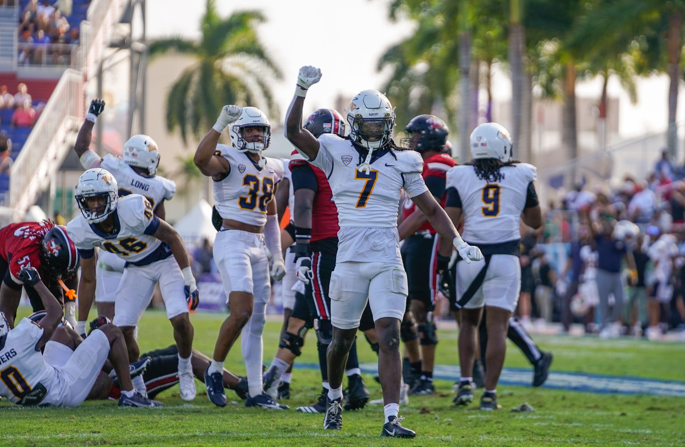 Dec 23, 2025; Boca Raton, FL, USA; Toledo Rockets safety Emmanuel McNeil-Warren (7) celebrates a third down stop against the Louisville Cardinals during the third quarter of the Boca Raton Bowl at Flagler CU Stadium. Mandatory Credit: Jeff Romance-Imagn Images