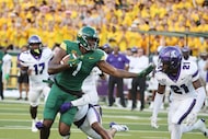Baylor tight end Michael Trigg fights off Tarleton State defensive back Jeremiah Postell...