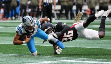 Nov 16, 2025; Atlanta, Georgia, USA; Carolina Panthers quarterback Bryce Young (9) is brought down by Atlanta Falcons inside linebacker Ronnie Harrison (36) in the first quarter at Mercedes-Benz Stadium.