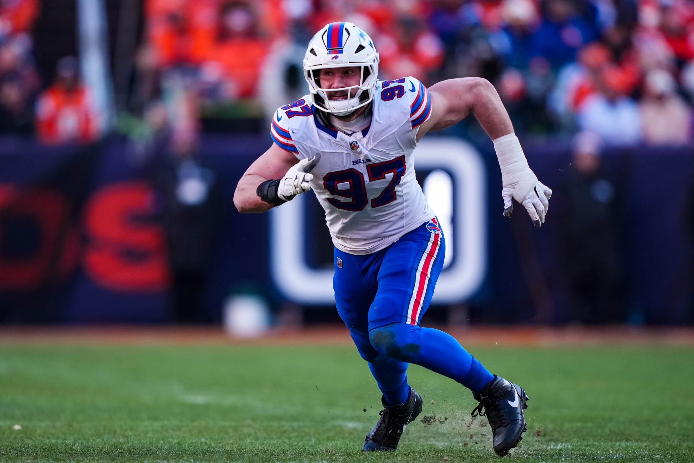 DENVER, COLORADO - JANUARY 17: Joey Bosa #97 of the Buffalo Bills rushes the passer during an NFL divisional playoff football game against the Denver Broncos at Empower Field at Mile High on January 17, 2026 in Denver, Colorado. (Photo by Perry Knotts/Getty Images)
