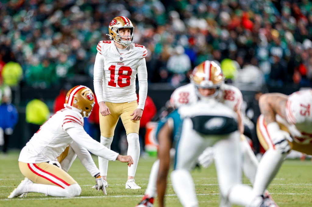 San Francisco 49ers kicker Eddy Pineiro (18) lines up a field goal.