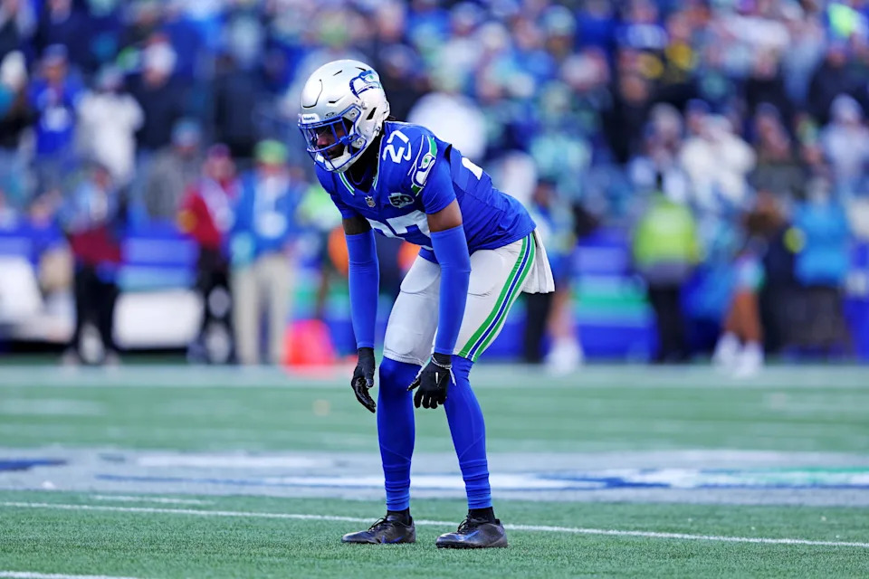Nov 30, 2025; Seattle, Washington, USA; Seattle Seahawks cornerback Riq Woolen (27) looks on during the second half against the Minnesota Vikings at Lumen Field. Mandatory Credit: Kevin Ng-Imagn Images
