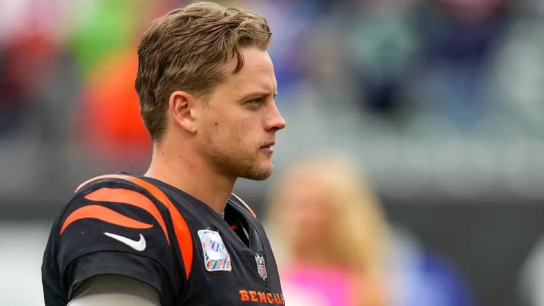 Joe Burrow walks off the field after a Bengals win over the Seahawks.