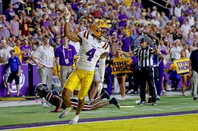 BATON ROUGE, LOUISIANA - OCTOBER 11: Cornerback Mansoor Delane #4 of the Louisiana State Tigers celebrates a pass defense during the game against the South Carolina Gamecocks at Tiger Stadium on October 11, 2025 in Baton Rouge, Louisiana. (Photo by Michael DeMocker/Getty Images)