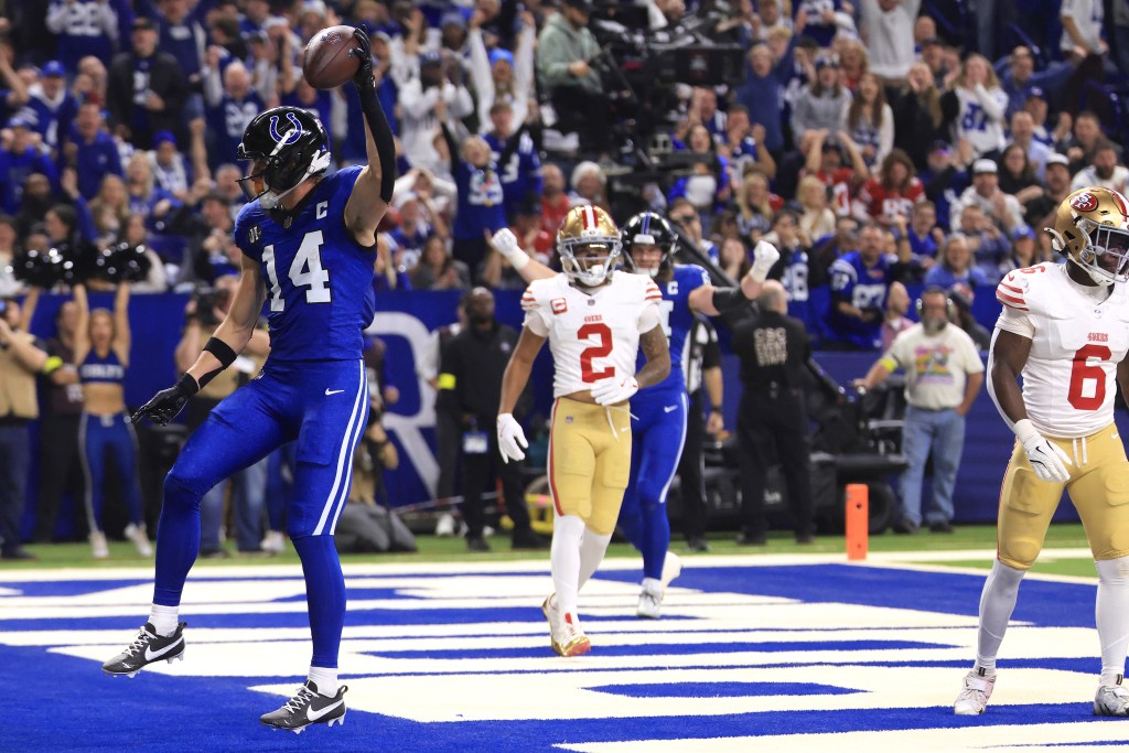 Indianapolis Colts player #14 celebrating a touchdown against the San Francisco 49ers.