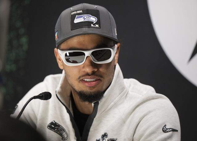 Seattle Seahawks wide receiver Jaxon Smith-Njigba (11) speaks to the media during the Super Bowl Opening Night Ceremony, at San Jose Convention Center on Monday, Feb. 2, 2026, in San Jose, Calif.