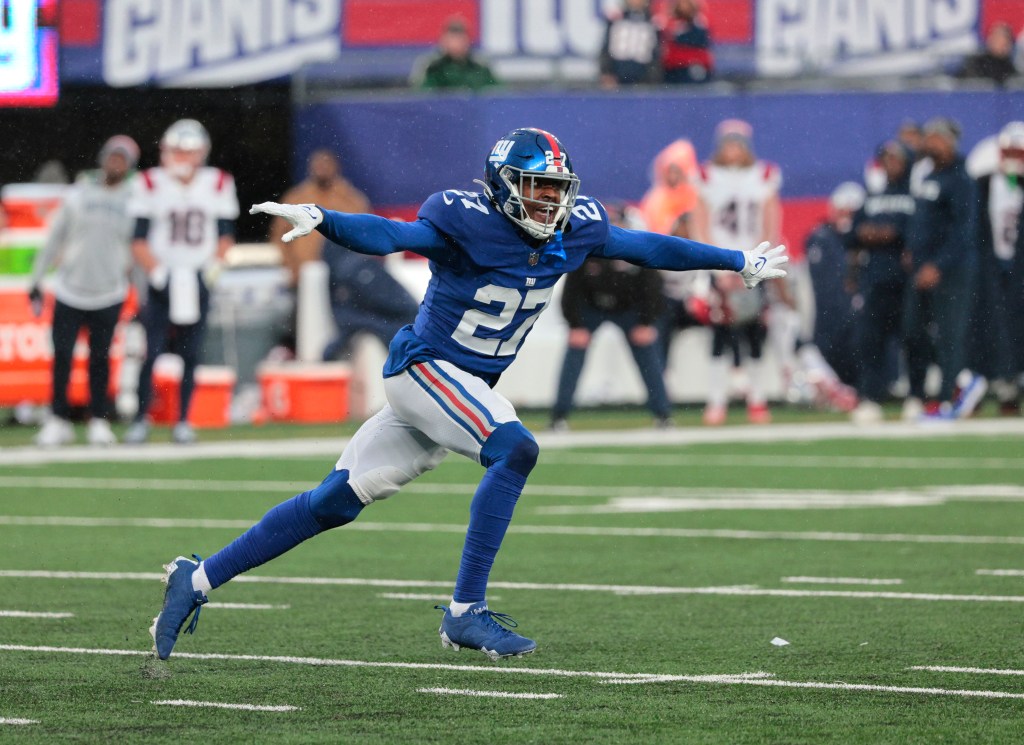 New York Giants safety Jason Pinnock #27 reacts after New England Patriots place kicker Chad Ryland #37 missed a field goal.