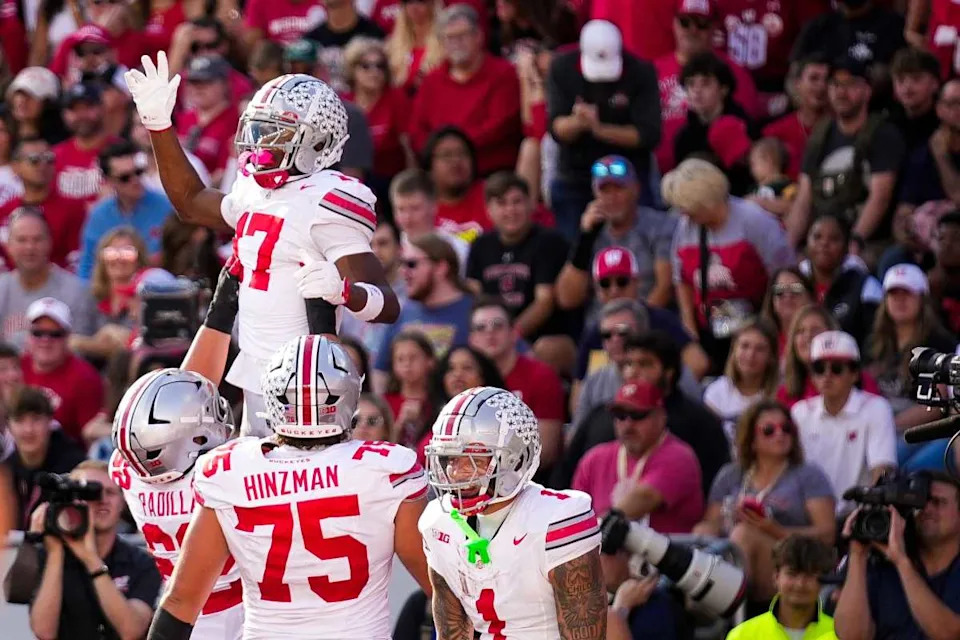 Ohio State Buckeyes wide receiver Carnell Tate (17) celebrates after scoring a touchdown.Samantha Madar&sol;Columbus Dispatch