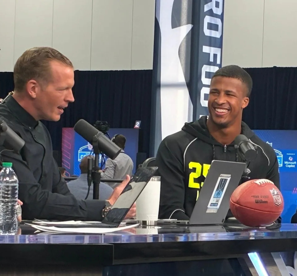 Ohio State star linebacker Sonny Styles right, speaks with NBC analyst Chris Simms at the NFL Combine in Indianapolis.