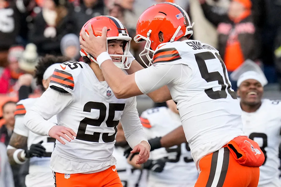 Cleveland Browns place kicker Andre Szmyt (25) and long snapper Rex Sunahara (50) celebrate after kicking the game-winning field goal as time expires in the fourth quarter of the NFL Week 18 game between the Cincinnati Bengals and the Cleveland Browns at Paycor Stadium in Downtown Cincinnati on Sunday, Jan. 4, 2026. The Browns kicked a last second field goal to win 20-18. | Sam Greene/The Enquirer / USA TODAY NETWORK via Imagn Images