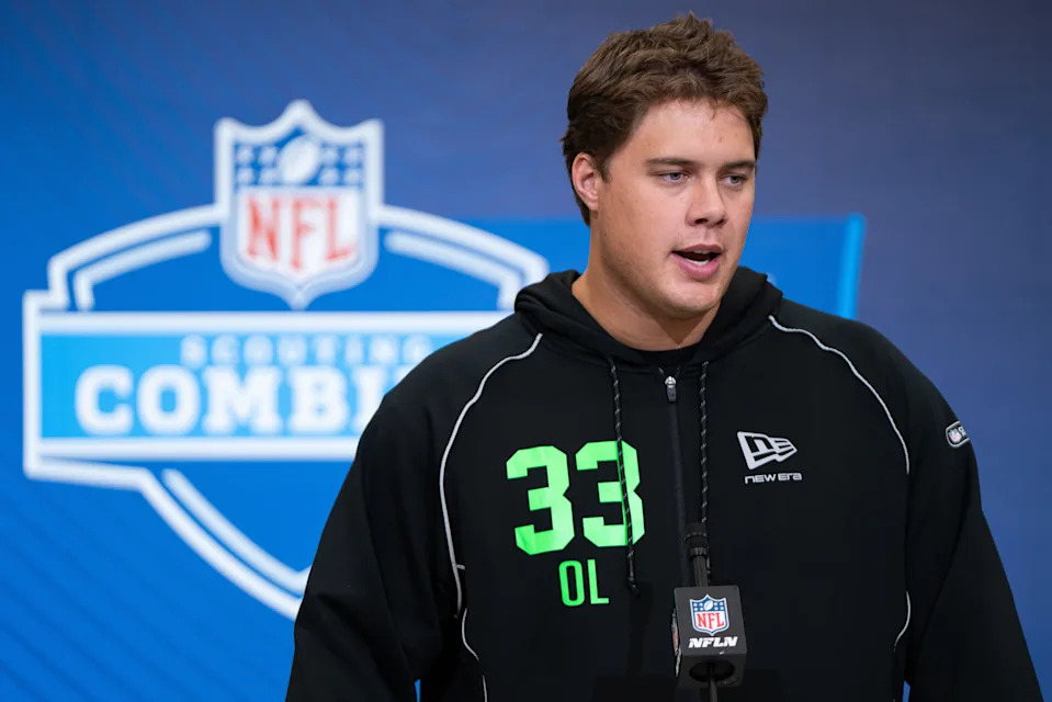 Feb 28, 2026; Indianapolis, IN, USA; Utah offensive lineman Caleb Lomu (OL33) speaks to members of the media during the NFL Combine at the Indiana Convention Center. Mandatory Credit: Jacob Musselman-Imagn Images