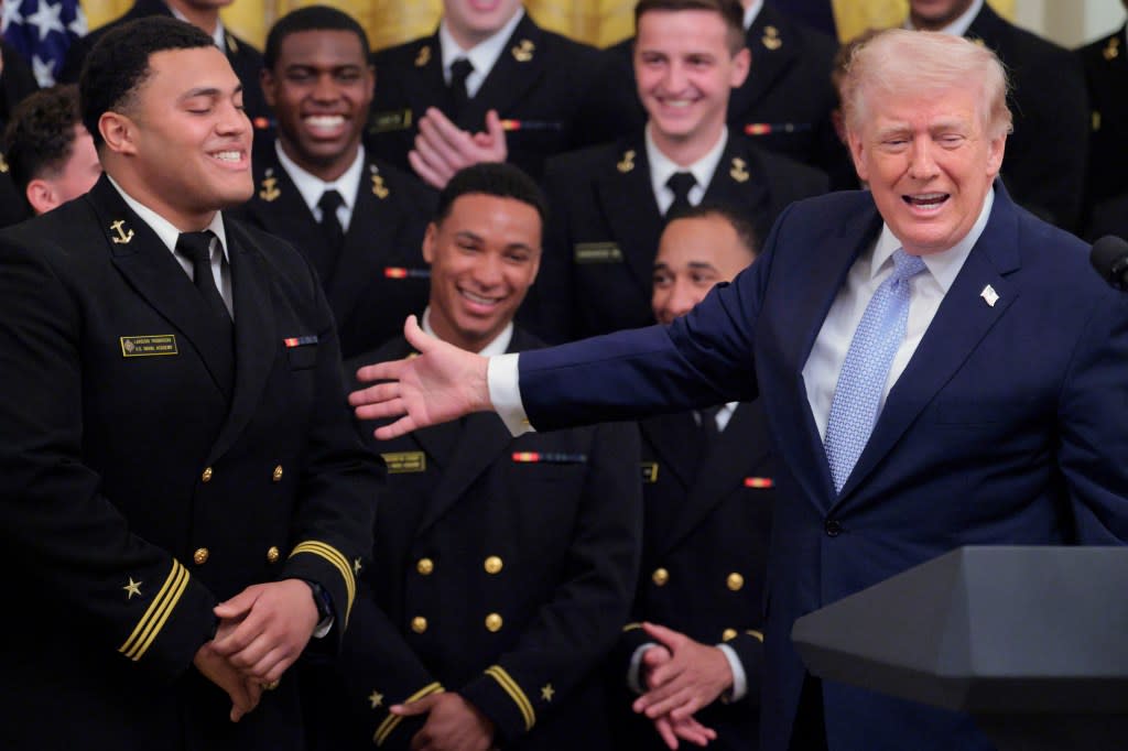 President Trump welcomed Navy midshipmen to the White House to present them with the Commander in Chief Trophy after they beat the Army team. Getty Images
