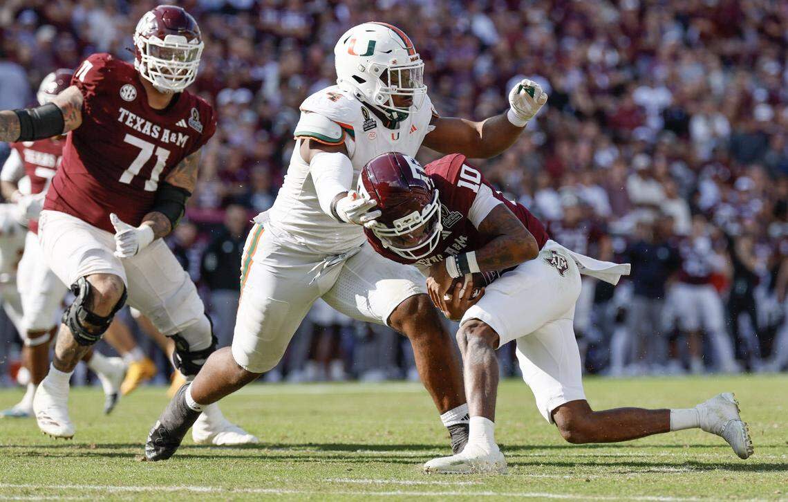 Miami Hurricanes defensive lineman Rueben Bain Jr. (4) sacks Texas A&M Aggies quarterback Marcel Reed (10) in the second half of the first round of the 2025 College Football Playoff at Kyle Field at College Station, Texas, on Saturday, December 20, 2025.